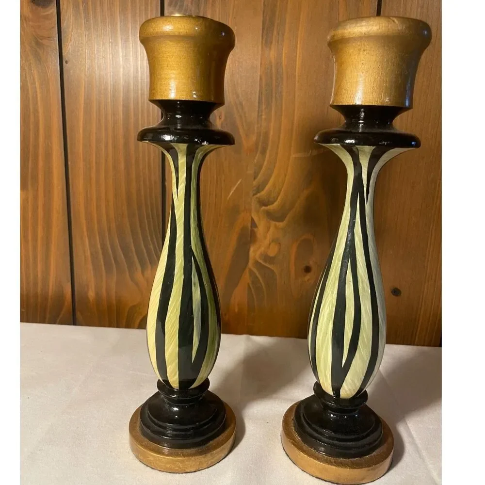 Pair of hand-painted wooden candlesticks